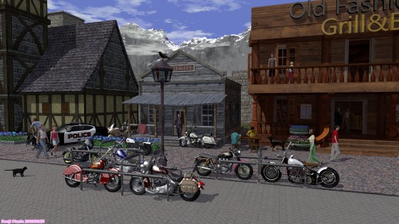 木造の建物の並ぶ通りと大型バイク