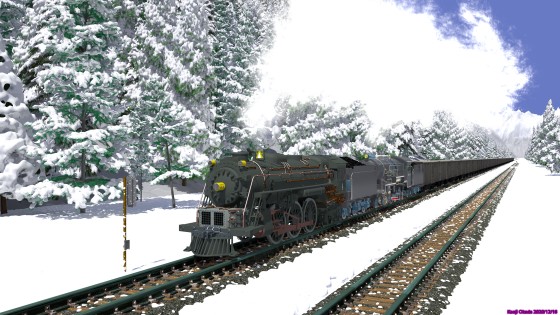 雪の谷間を走る蒸気機関車